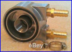 thumbnail image 2 of Full Flow Engine Oil Cooler Sandwich Adapter Kit With Fittings – Ford Ram Cummins Diesel (1″-16) By Wvoheater.com 2 of 4